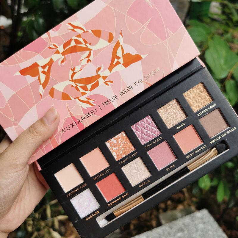 Koi 12-color pearl sequin eyeshadow palette.