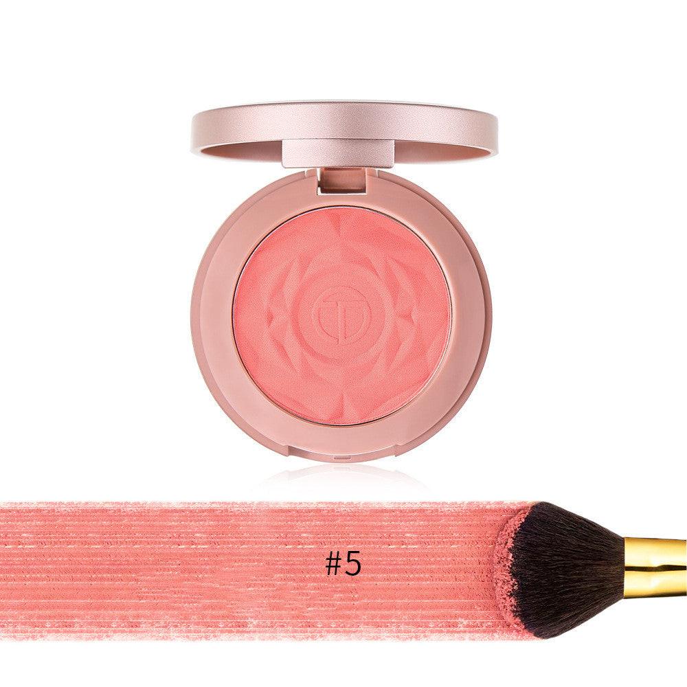 Single color blush makeup.
